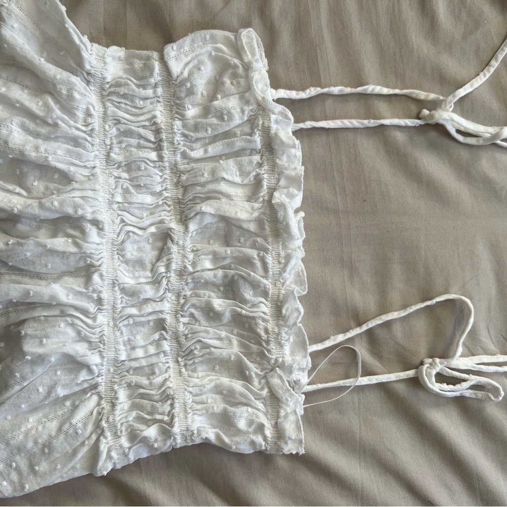 White Ruffled Sleeveless Top